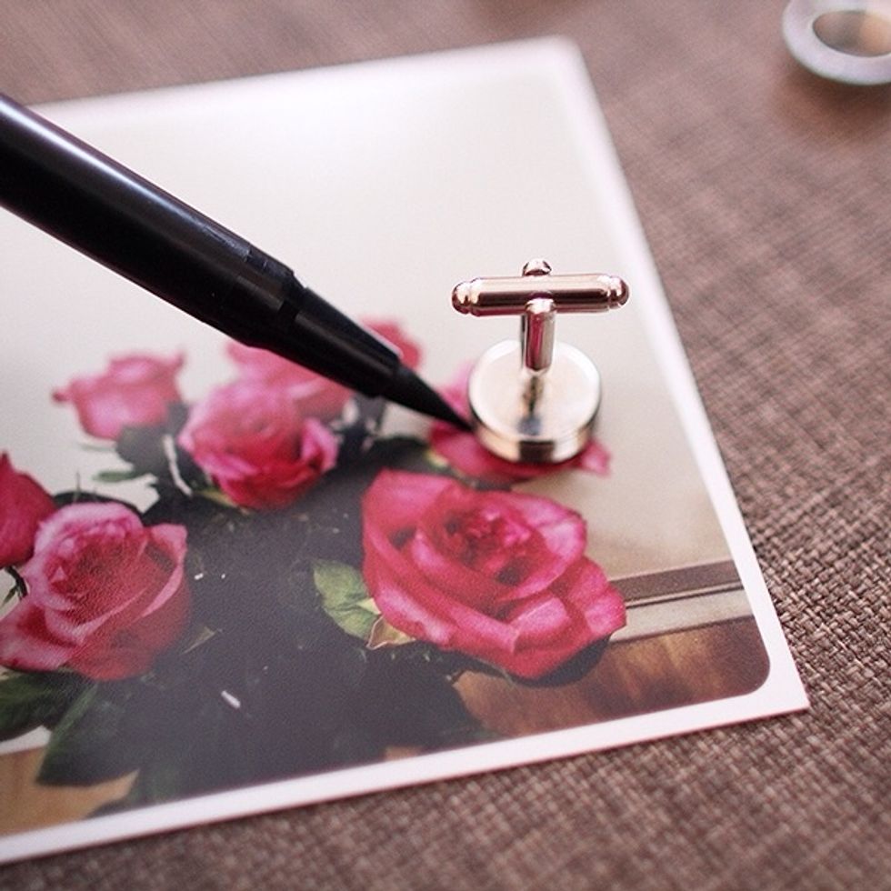 Use the cuff link base to measure the image area, which is 15mm. Cut out the circle from your photo print, it doesn\u2019t have to be perfect.