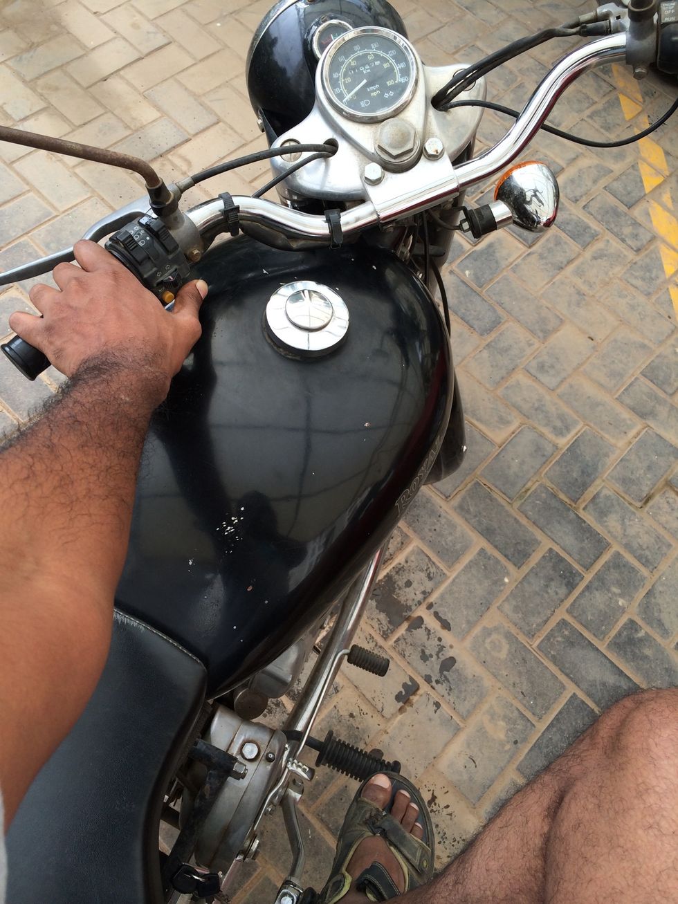 Use the decompressor lever and kick the kick start lever until the ammeter shows charged state.