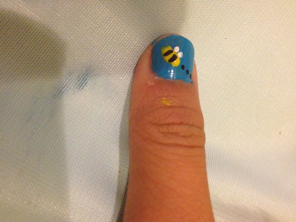 Use the dotted or the toothpick to put on 2 white wings\ud83d\ude03