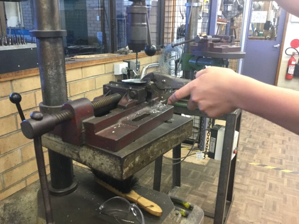 Use the drill press to drill the holes in all your pieces  First piece: on the flat bit of the end  Second piece: same as the first Third piece: On top and bottom on the sides
