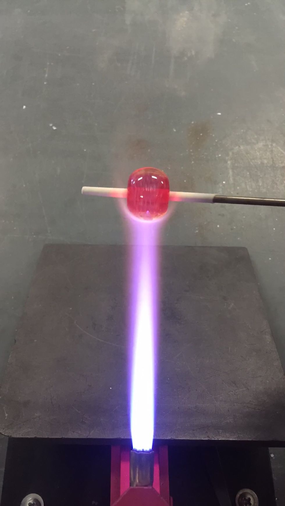 Use the flame to polish out any tool marks.