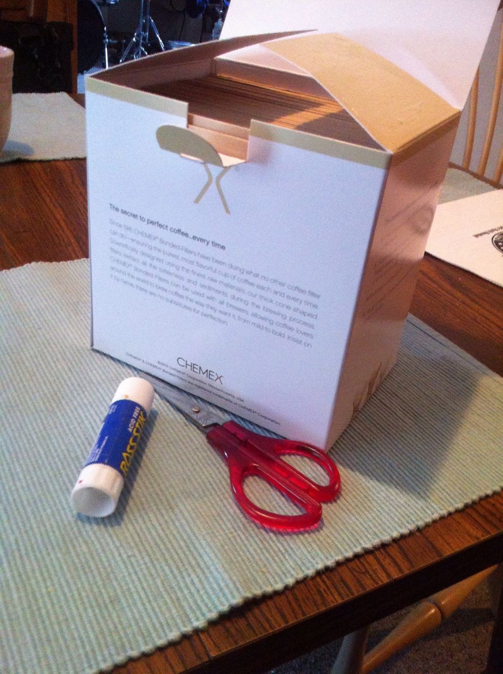 Use the glue stick to glue the top to the side flaps AND the front lip. Be careful not to get the glue on the filters.