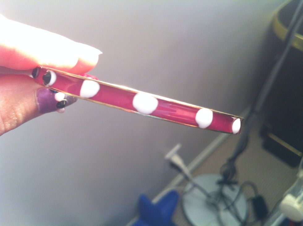 Use the glue to locate where you want to place the blings, like so.