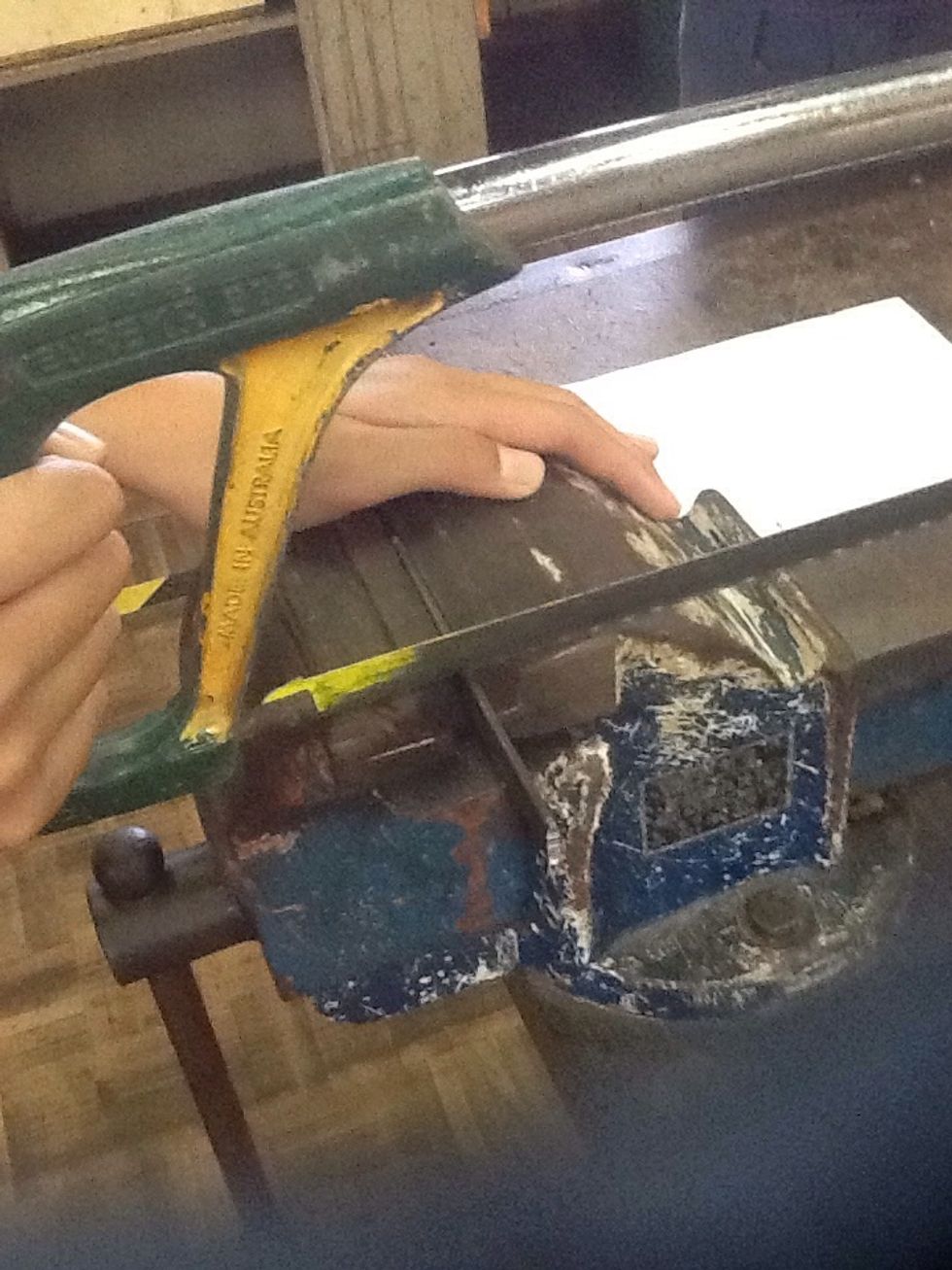 Use the hacksaw to saw off the flatbar. Repeat however many times you need.