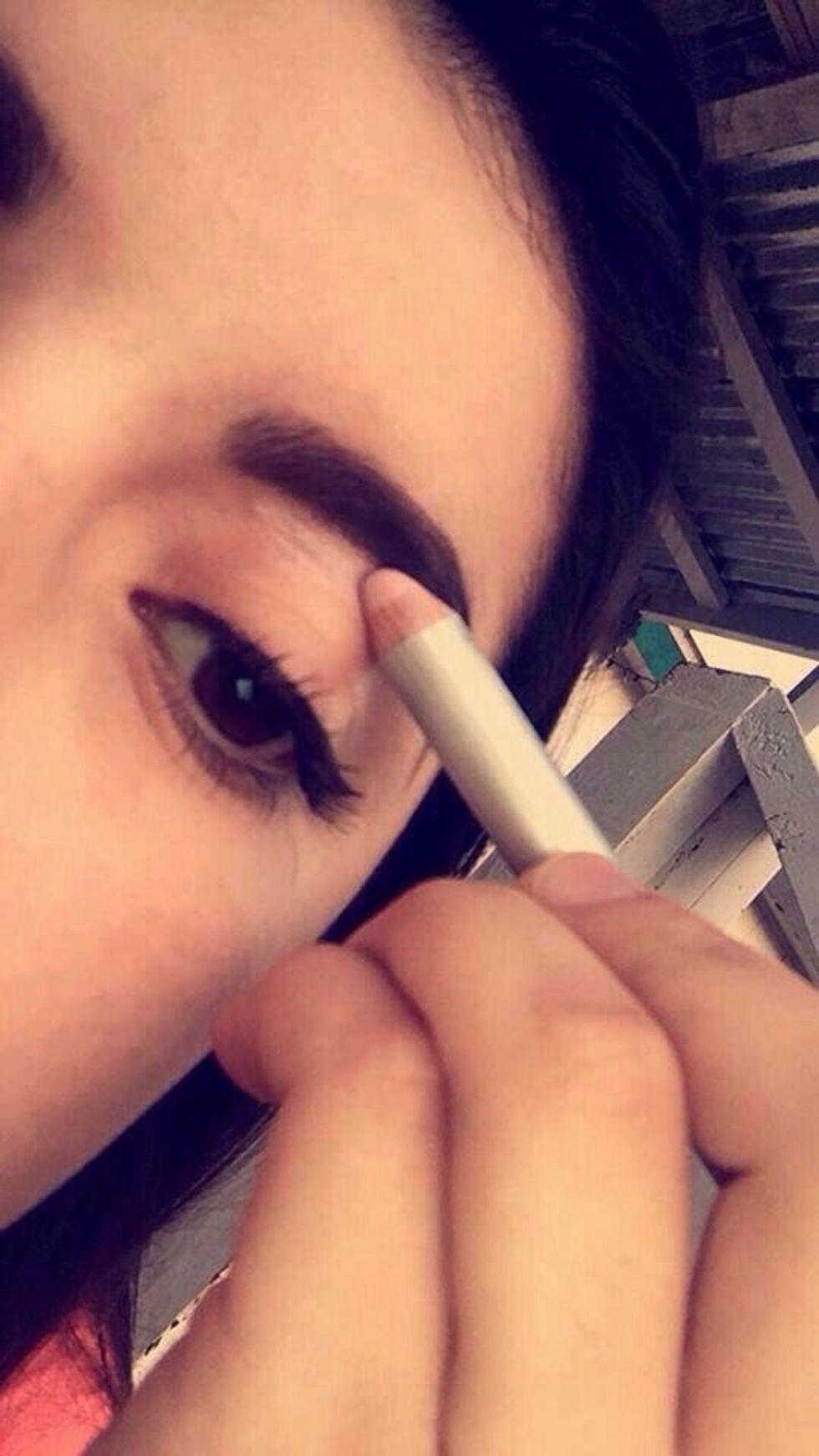 Use the High Brow Highlighter pencil to highlight under your brows to lift your brows up and then blend it with your finger.