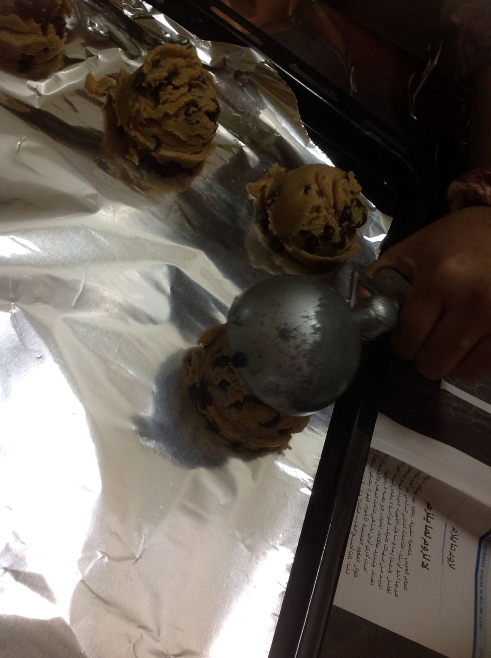 Use the ice cream scoop  to make the cookies