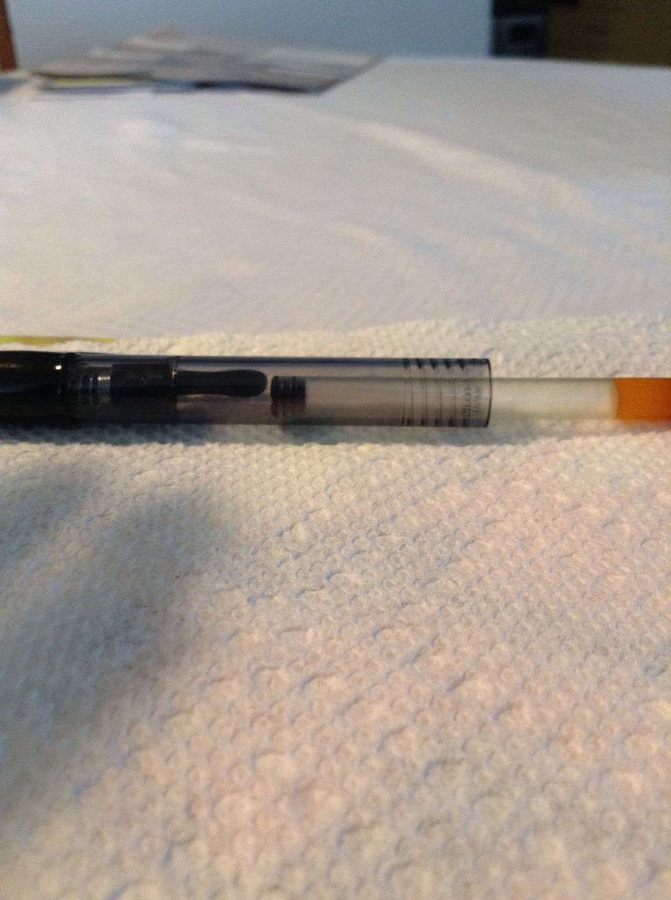 Use the ink cartridge to lock it all in