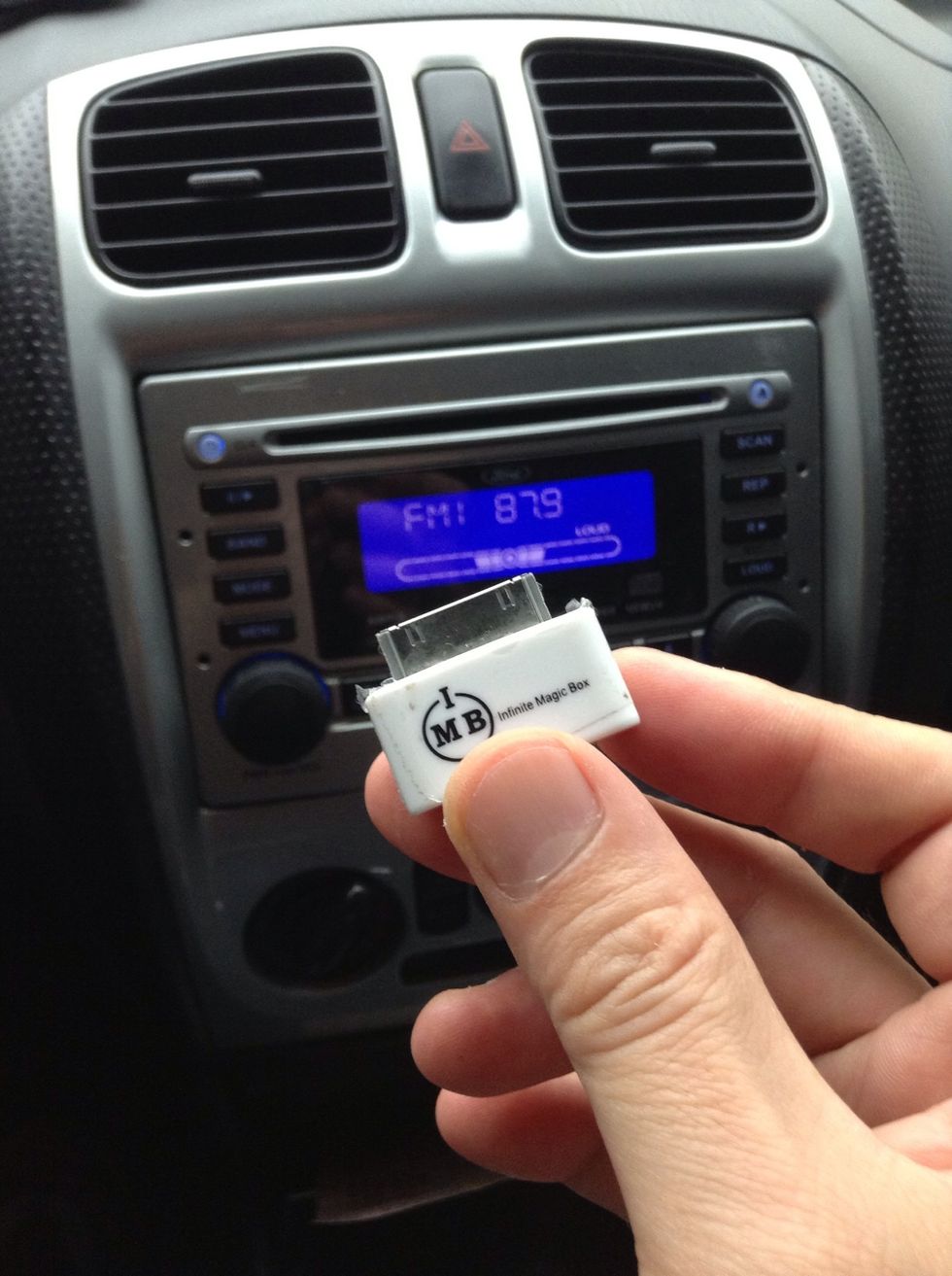 Use the iPhone FM Transmitter iFM transmitter.