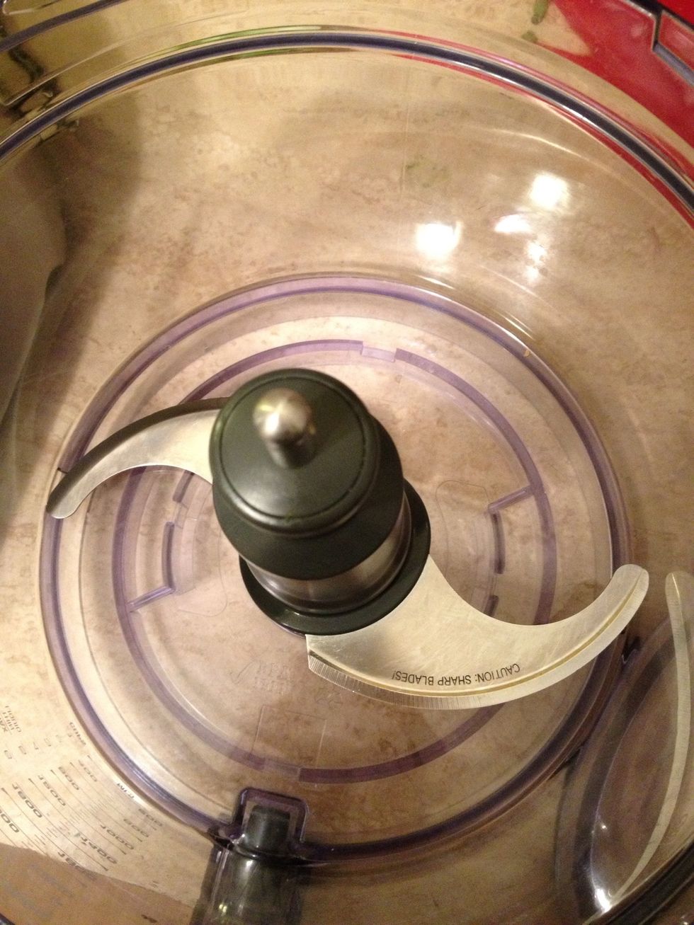Use the large blade of your food processor.