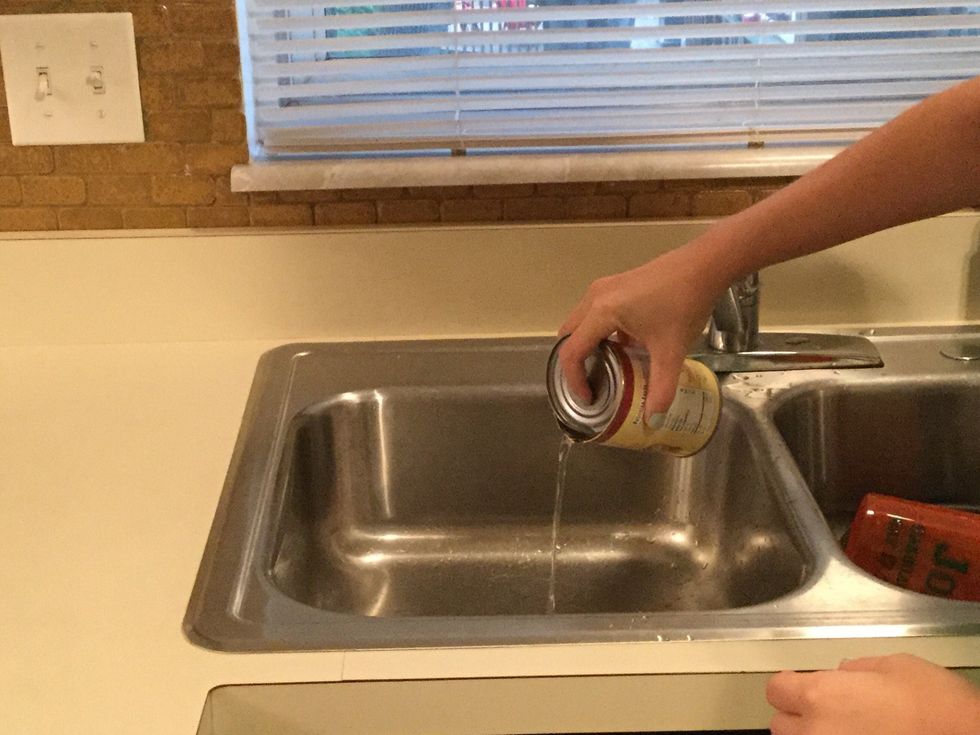Use the lid to drain all of the juice out of the can of mushrooms