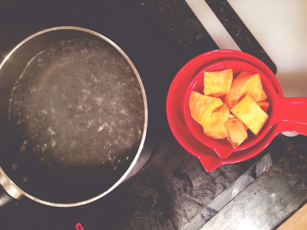 Use the mandoline to peel the potato. Cut it in bits and boil for 10-15 mins or until tender (test with a fork, if it feels soft inside and falls off when you stick it in, it's done)