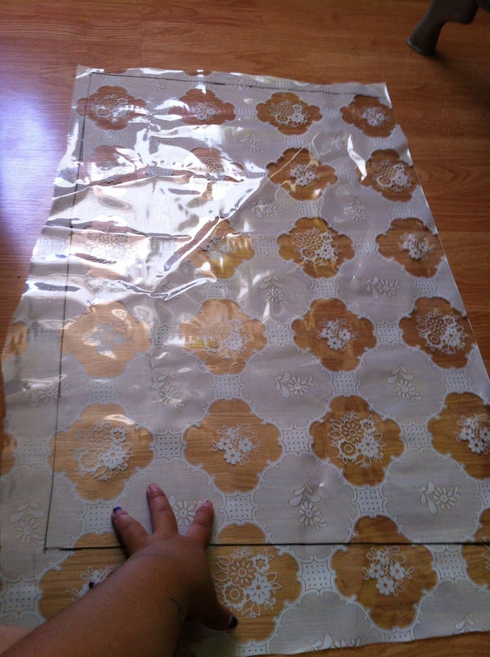 Use the marker and trace the shape onto the vinyl. I added about 1.5 inches to the sides so I could trim it later.