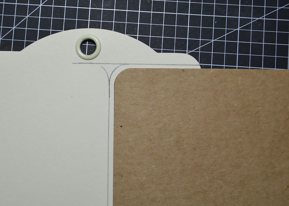 Use the other tag once again to mark out the corner.
