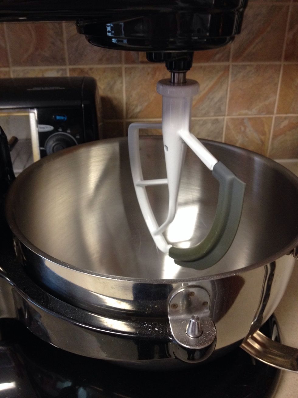 Use the paddle/scraper attachment