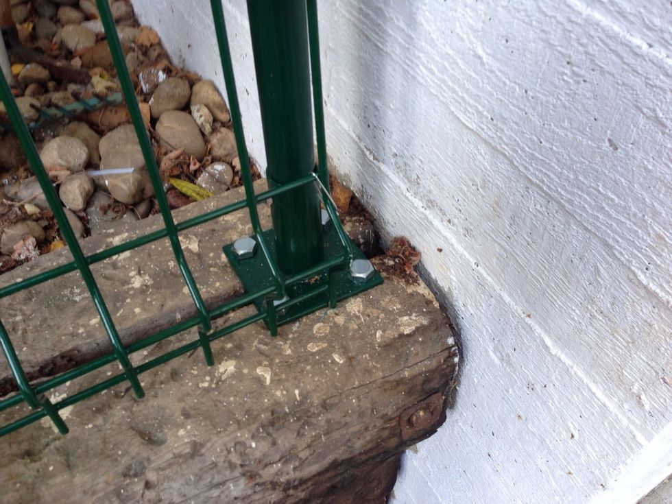 Use the pole-brackets to mount the pole. We had a wooden foundation which was really easy. In case you have a foundation made of stone or concrete, you may need special screws.