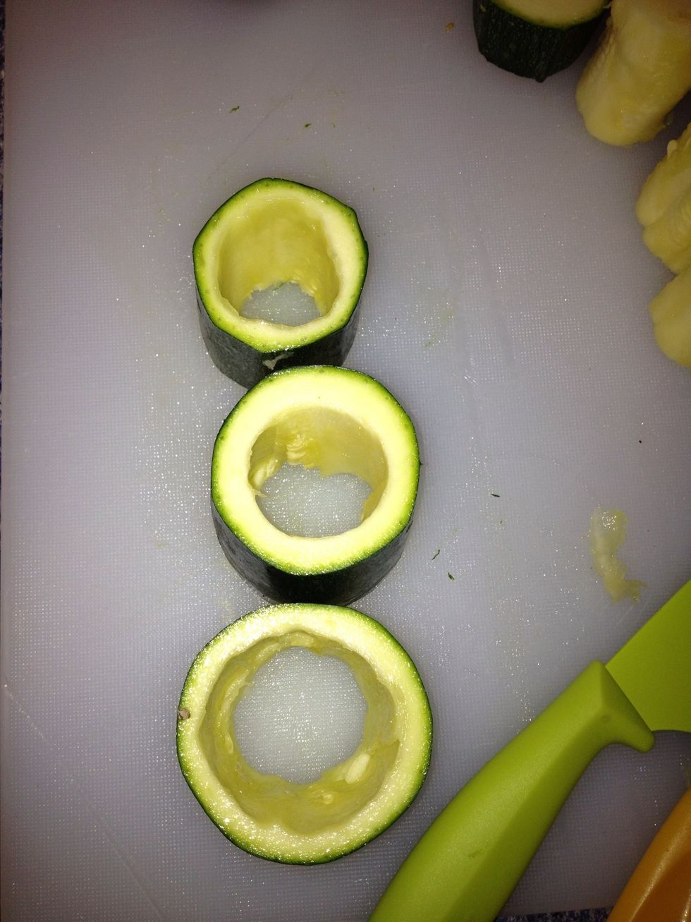 Use the potato peeler to hollow the out
