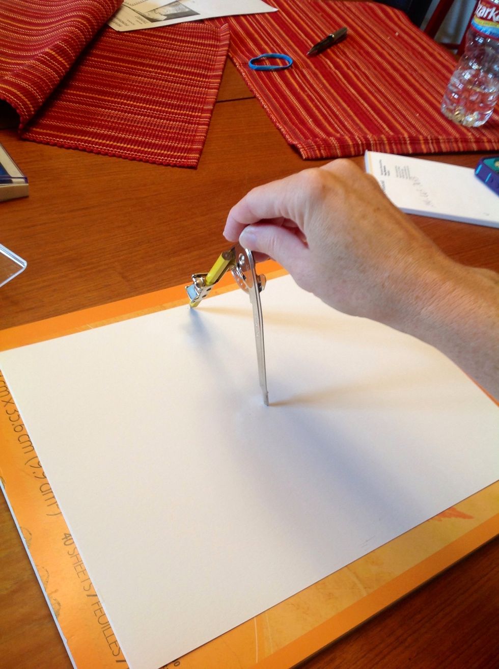 Use the protractor and draw the largest circle you can on your paper.