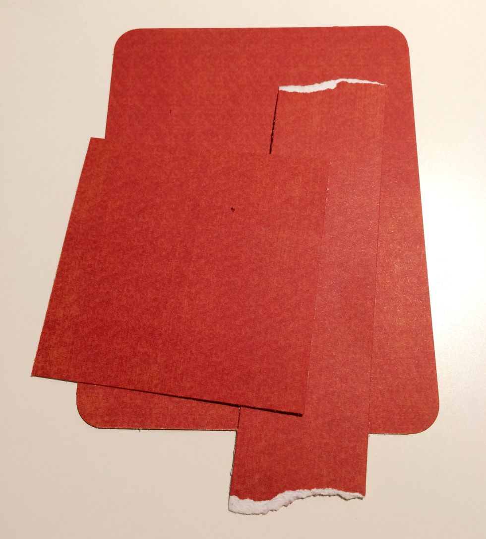 Use the red paper from the solids pad. Cut out these 3 pieces: 3 5/8" x 4 3/4,1 1/4" x 4 7/8" & 2 3/4" x 3 1/8". Tear a bit off the top and bottom of 1 1/4" paper. Round all corners on large piece.
