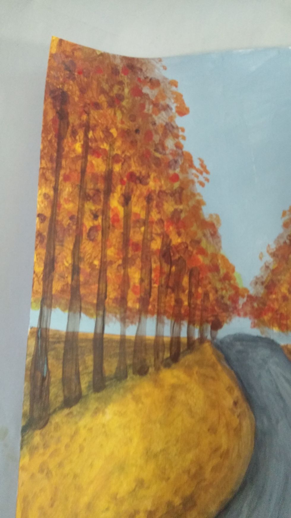 USe the richest base color for the trunks. Follow the guidelines to place the trunks of the trees on both sides