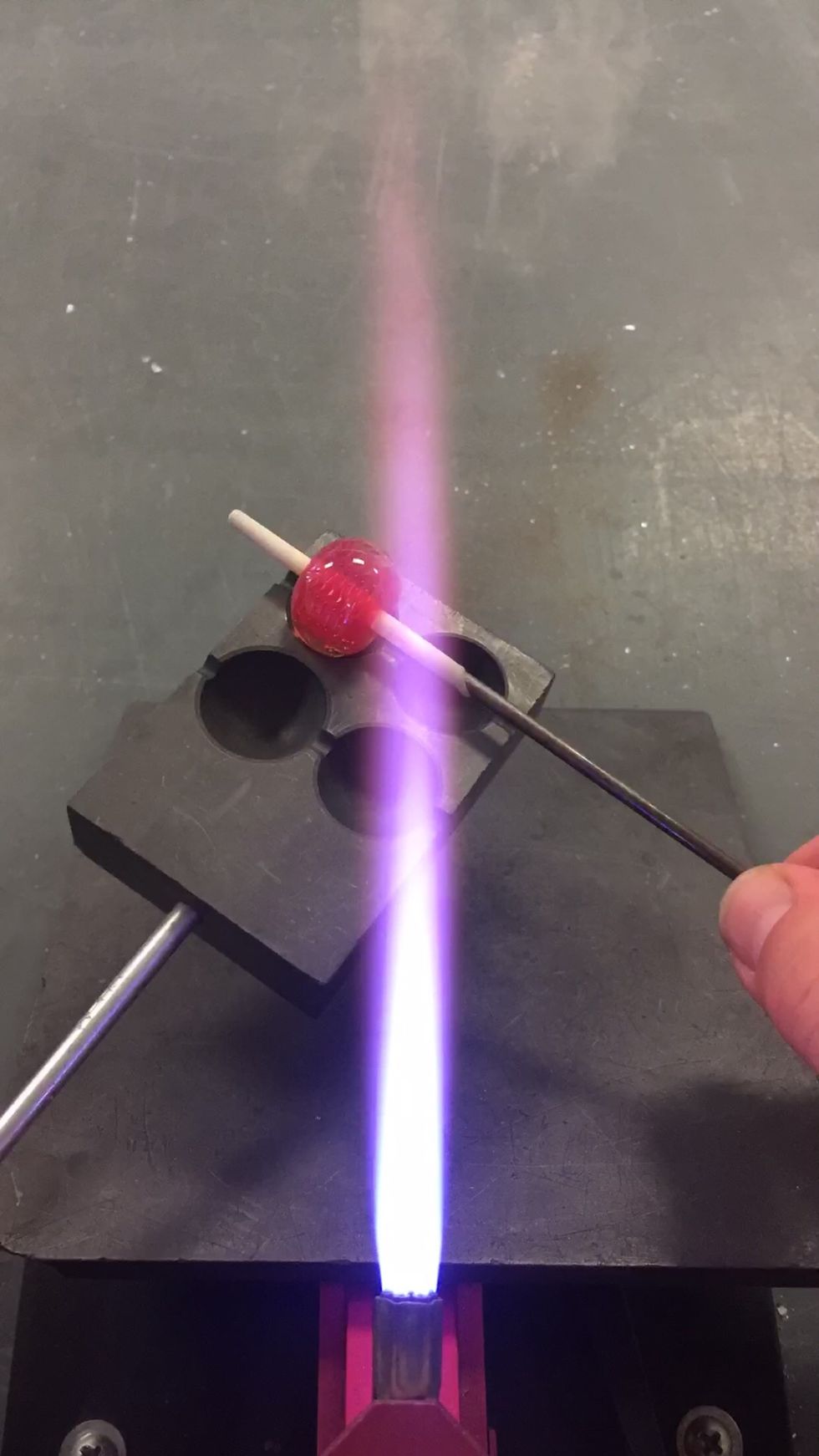 Use the ring shaped edge of a too-small bead mold to shape the bead.