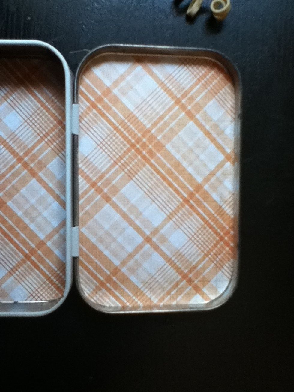 Use the same method to stick the paper labeled "top inside" to the inside of the lid.