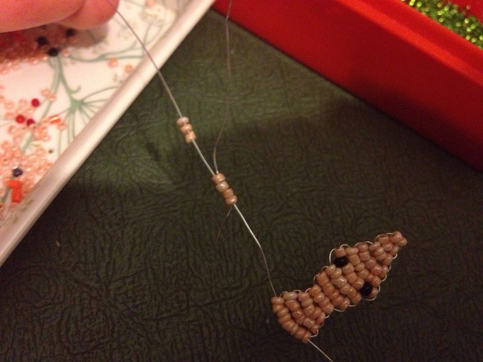 Use the SAME PIECE OF WIRE and thread back on yourself through the 4 closest to the body...