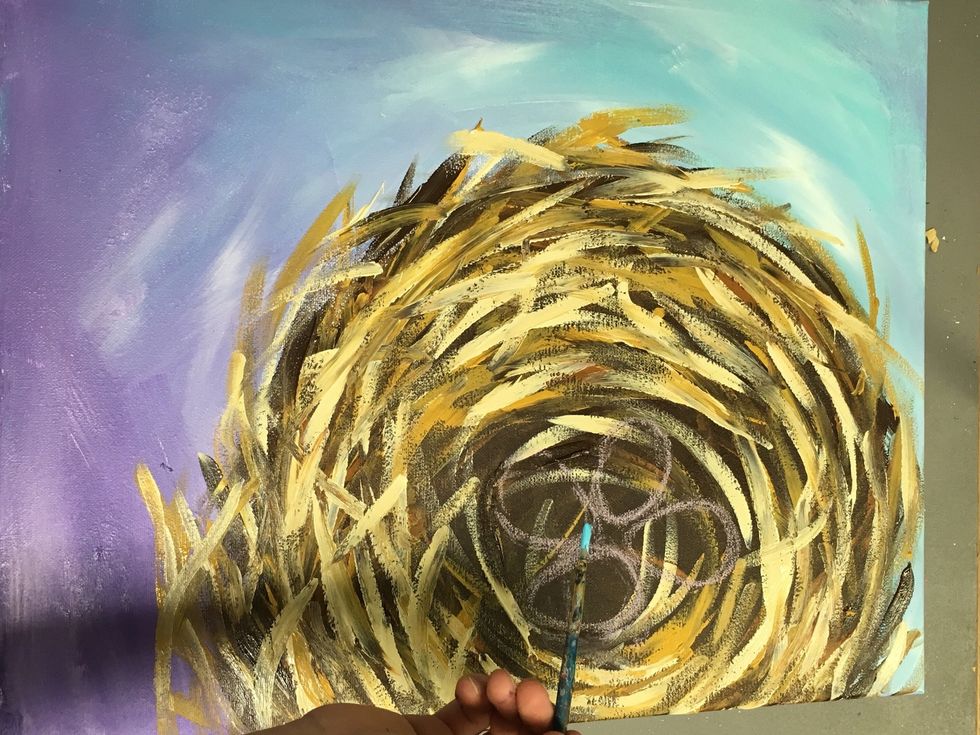 Use the same small brush to paint the eggs the light blue color. We will also use white towards the center of each egg to make them look more 3D.