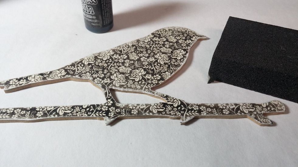 Use the sandpaper to clean up the edges. I also distress the paper a bit by sanding. This gives it a weathered look, which I really like.