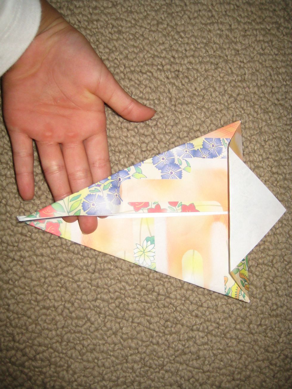 Use the scissors to cut on the crack,   cut about half way through the crack.