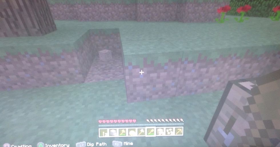 Use the shovel to dig out a secure area. Start with a small square at first. Build on when finished with a good start.