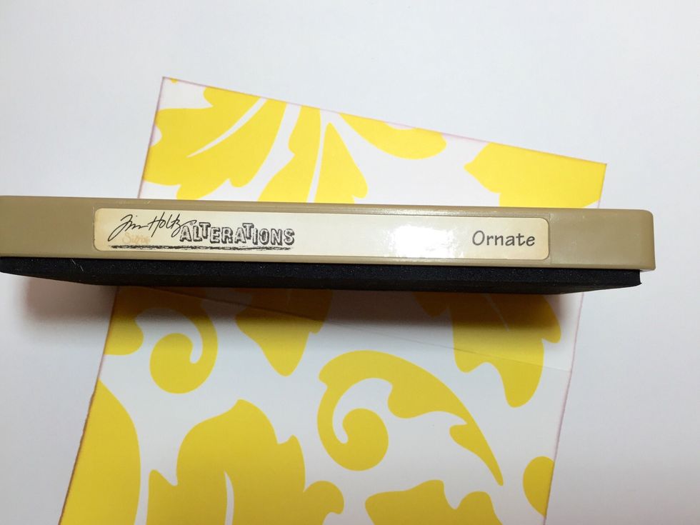 Use the Sizzix Ornate die or whatever border die you have, on the flap end of the paper