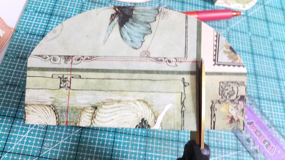 Use the smallest set of album pages, left one inch by the sides, draw a window and cut out