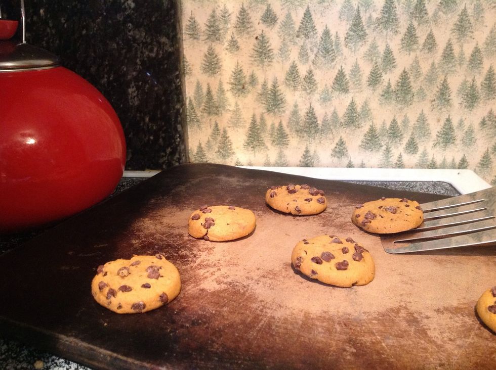 Use the spatula to move the cookies from the pan to the cooling rack or plate.