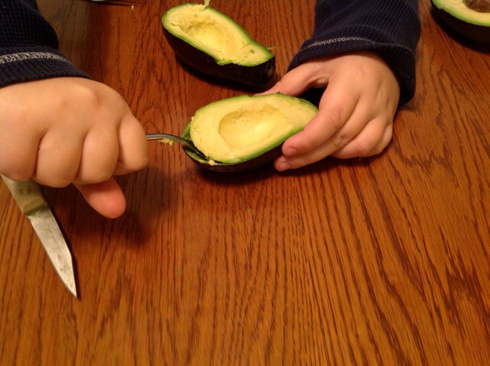 Use the spoon to scoop out the meat.