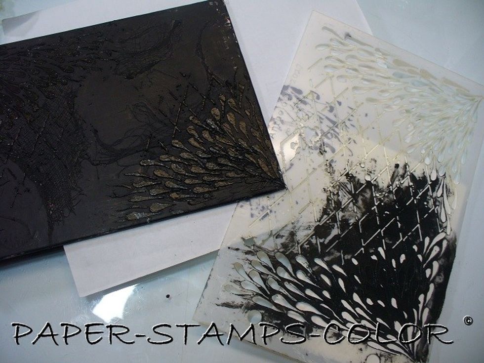 Use the stencil to add black structure paste to the surface and leave to dry.