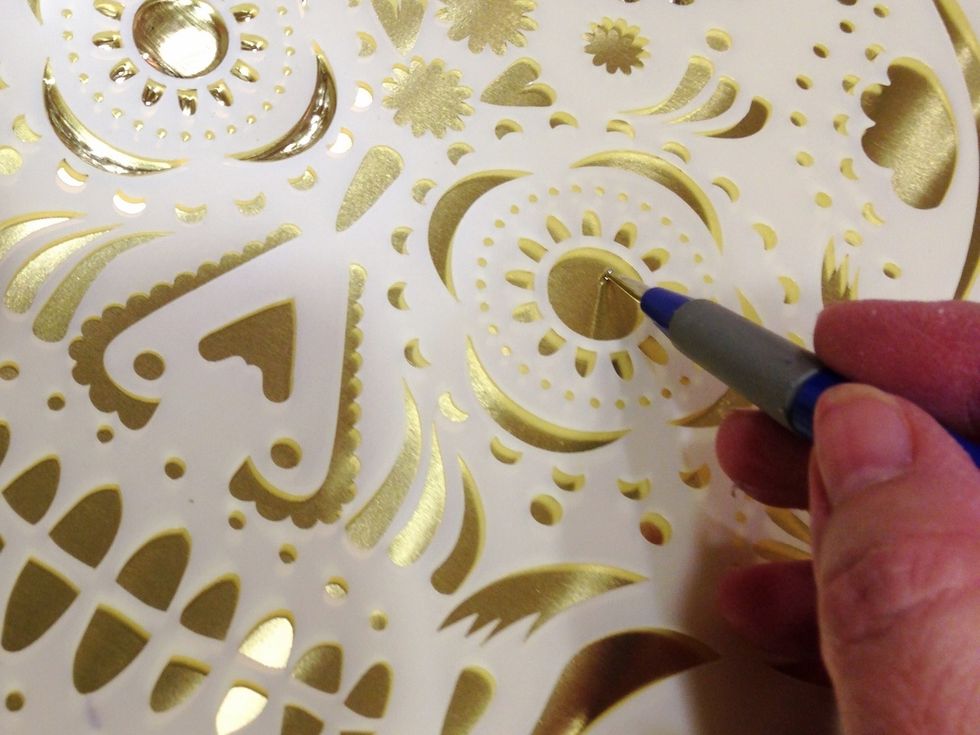use the stylus to outline and then "fill in" the design. press with enough pressure to add dimension when embossing, but not enough to break through the metal.