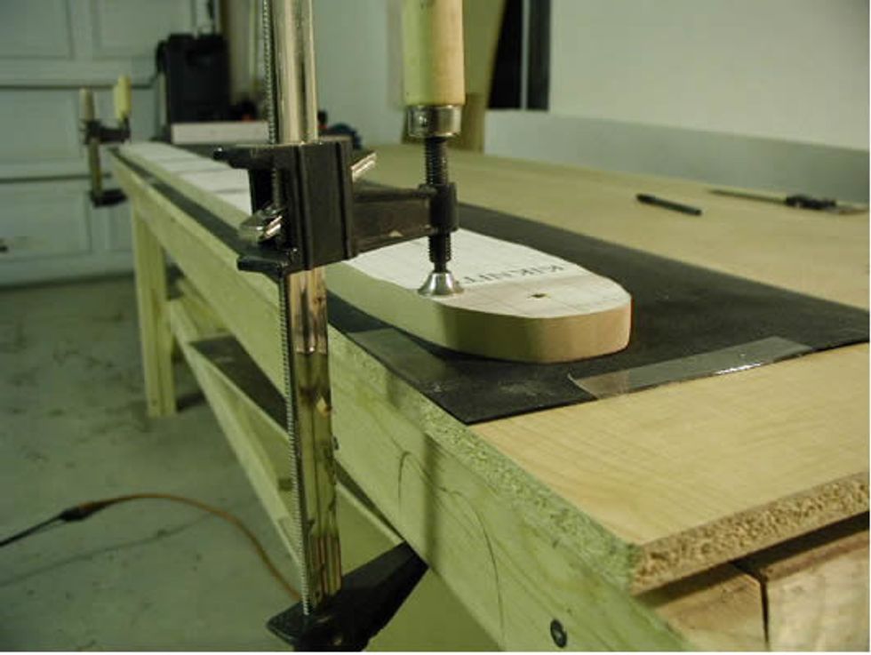 Use the template to cut out the base material