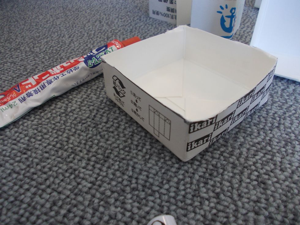 Use the third milk carton, and cut the bottom part with the height of 2.5cm.