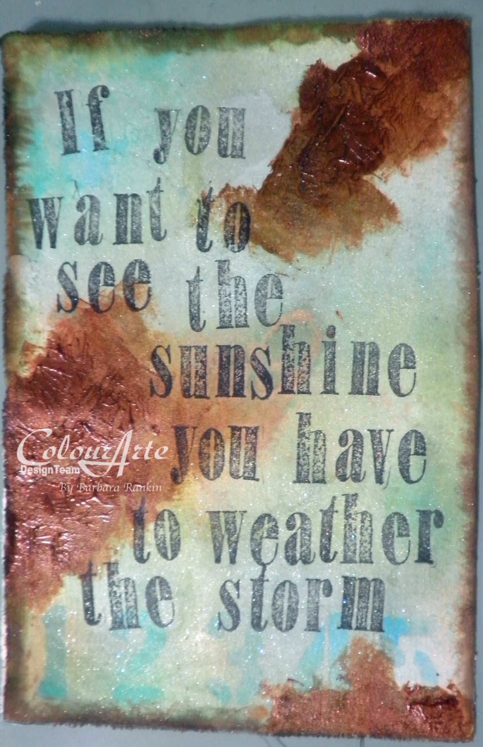 Use the Tim Holtz alphabet stamps to stamp the sentiment with black archival ink.