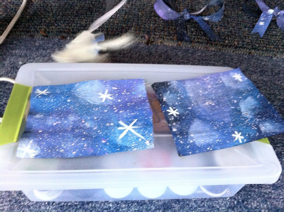 Use the tooth pick or fine paint brush and add stars if you want