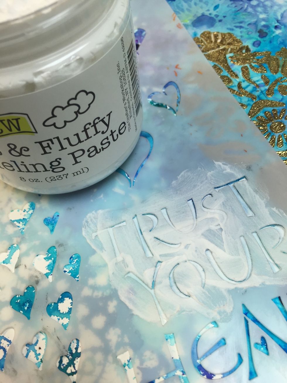 Use the white paste to continue your title