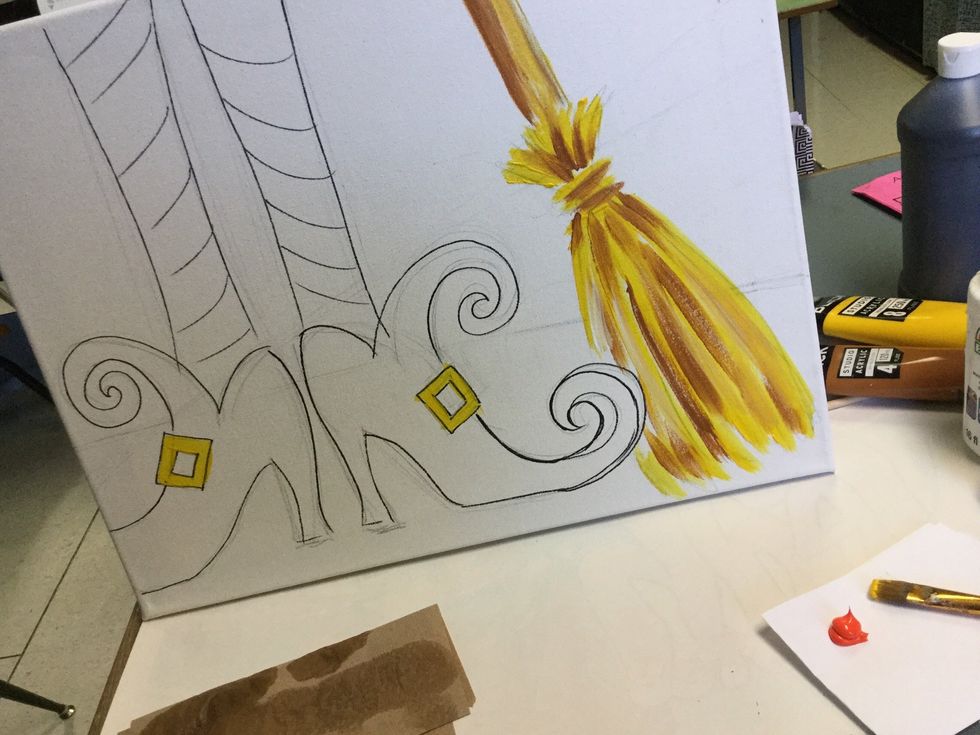 Use the yellow on the boot buckles.