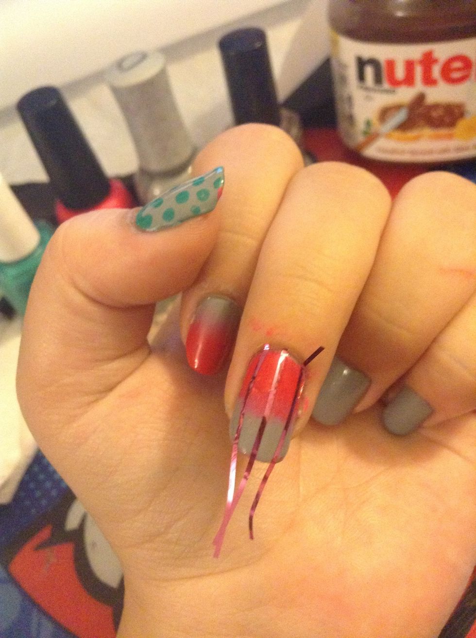 Use three or four pieces if you have tape. If you don't, I've done triangles or blocks with regular tape. If you can cut shapes out of tape, you can do that too. Make sure what's on your nail is dry.