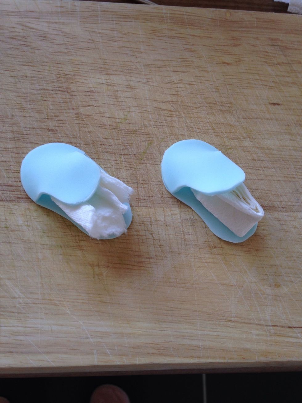 Use tissue to 'fill' the shoe and let dry for a few minutes