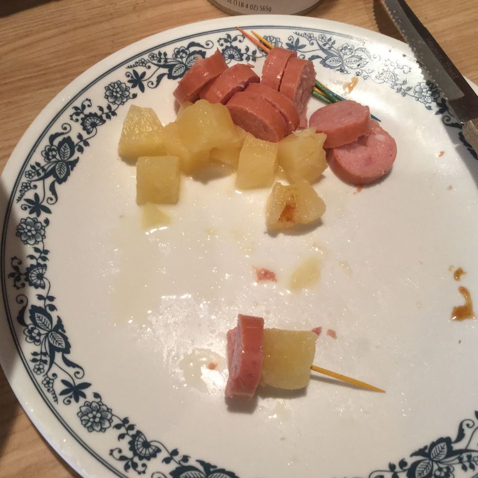 Use toothpicks to spear pineapple and then sausage. Dip into sauce and place in pan lined with aluminum paper or parchment paper. Heat for approx. 15-20 minutes on 350 degrees.