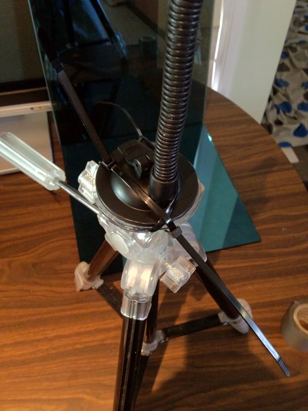 Use two or three cable ties to secure the two items together