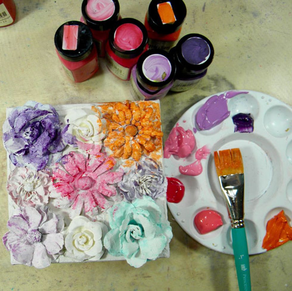 Use Velvets for the first layer of color because they are more opaque. Three flowers are painted using Orchid and Mardi Gras, three using Tango and Persimmon, and three using Cotton Candy and Fiesta.