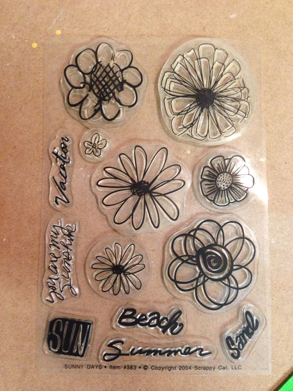 Use whichever flower stamps you have. I used four of these Scrappy Cat Sunny Days stamps.