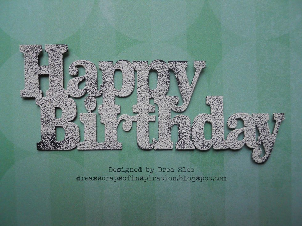 Use white embossing powder over the paint to mimic chalk.