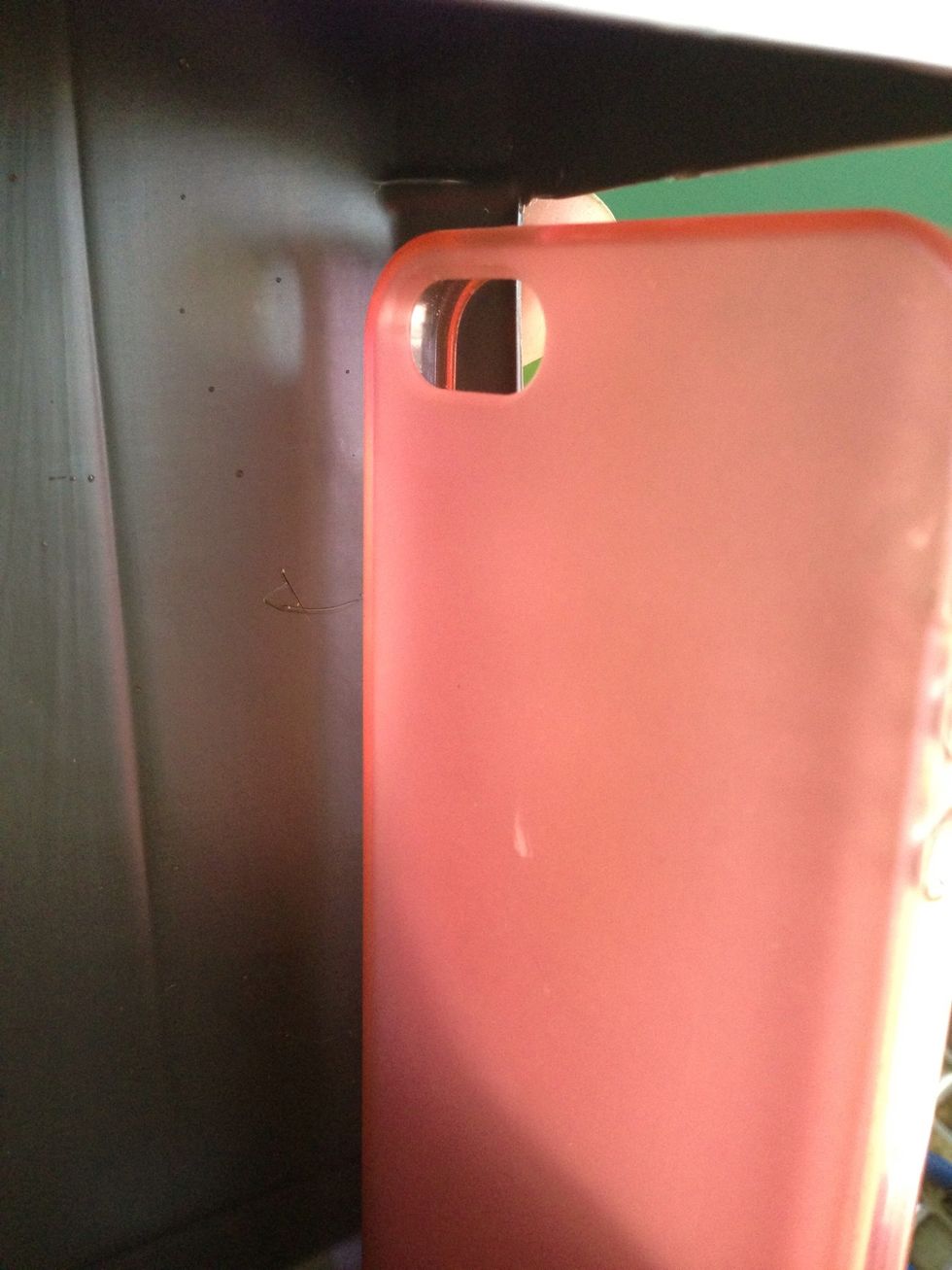 Use your case to mark where the cut-out window for your camera should be.